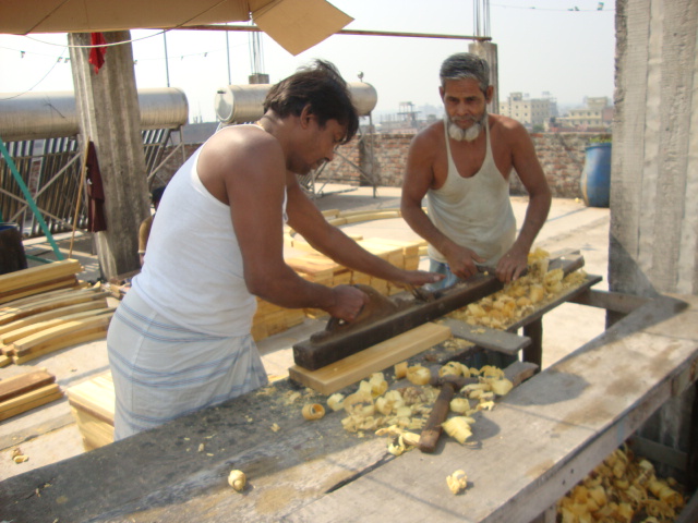 Carpenters preparing wooden drilled for better a drainage system UNIDO improved chrome tanning, tanning drum modification Re-Tie Bangladesh